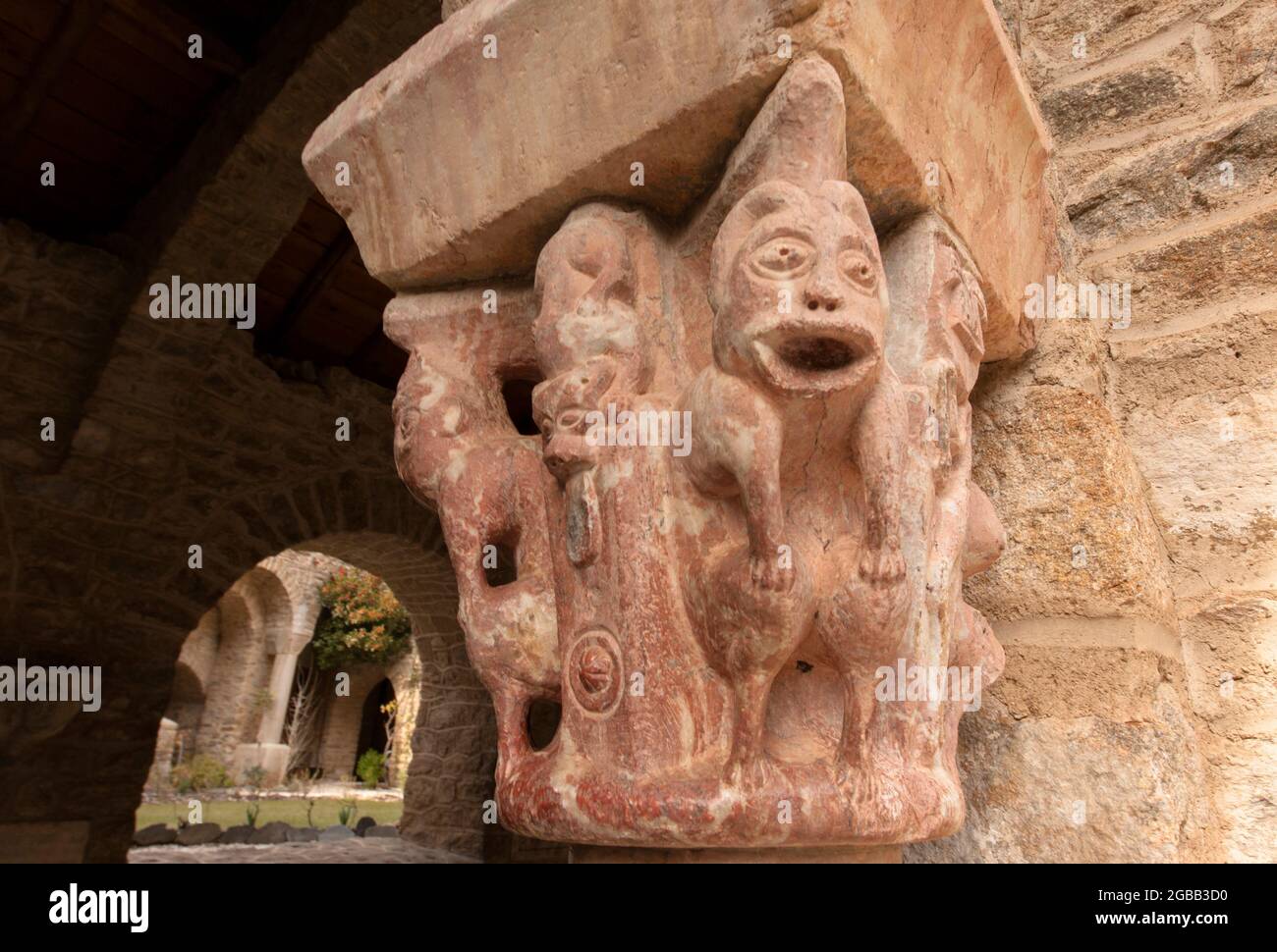 The cloister of Saint-Martin-du-Canigou is a rebuilt masterpiece of romanesque architecture and a spiritual retreat in the Pyrenees, France Stock Photo