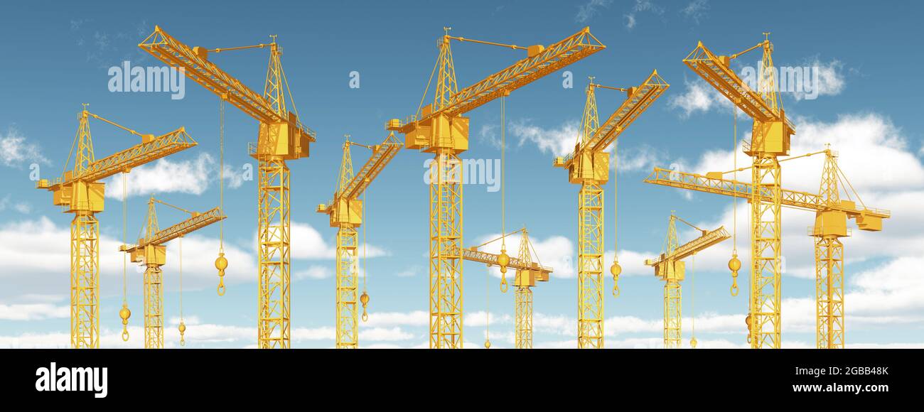 Construction cranes against a blue sky with clouds Stock Photo - Alamy