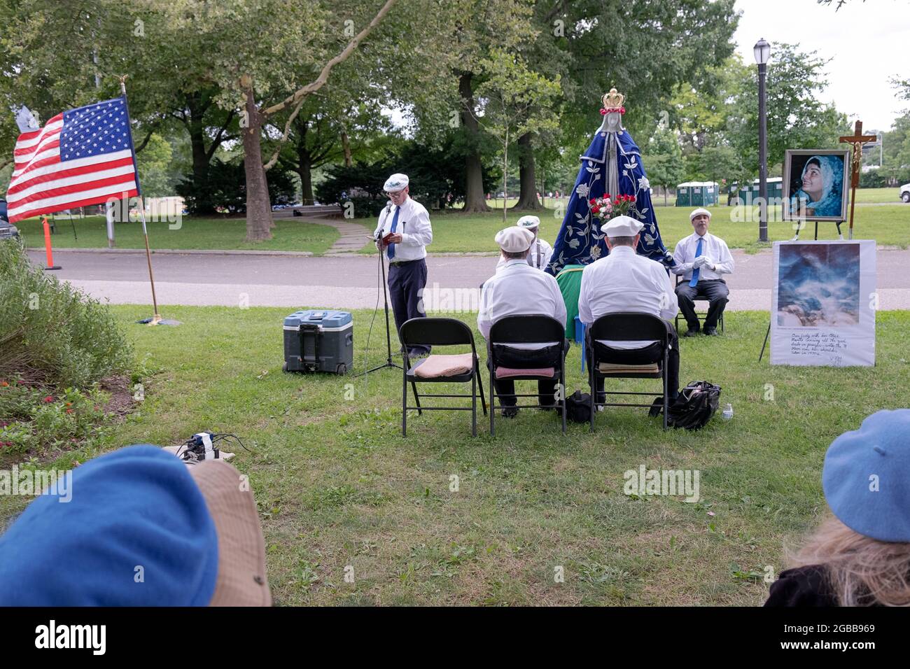 Devout Roman Catholics pray at a service near the Vatican Pavilion site in Flushing Meadows park where Mary & Jesus appeared to Veronica Lueken. NYC Stock Photo