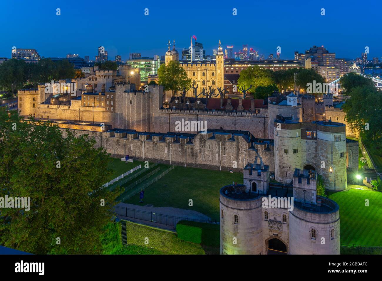 View of the Tower of London, UNESCO World Heritage Site, from Cheval Three Quays at dusk, London, England, United Kingdom, Europe Stock Photo