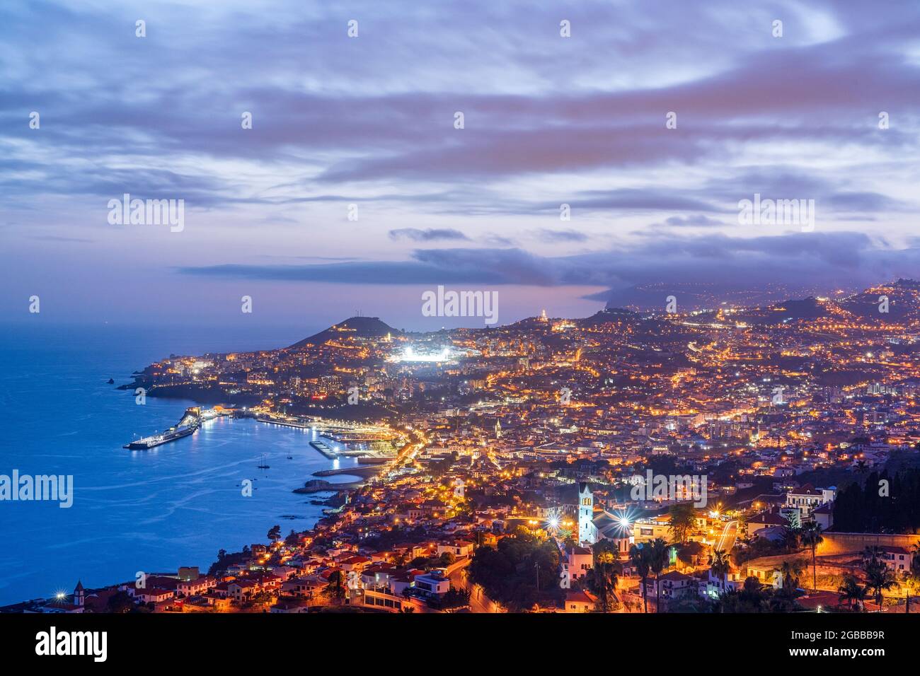 Dusk over the iIluminated city of Funchal viewed from Sao Goncalo, Madeira island, Portugal, Atlantic, Europe Stock Photo