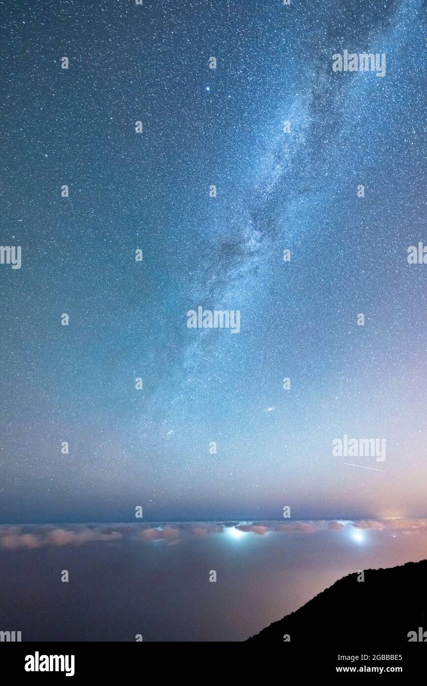 Bright stars of Milky Way in the night sky over the Laurissilva Forest of Fanal, Madeira island, Portugal, Atlantic, Europe Stock Photo