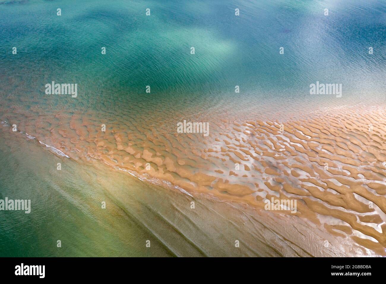 Aerial photograph of the Doom Bar emerging from the Camel Estuary at low tide in spring, Padstow, Cornwall, England, United Kingdom, Europe Stock Photo