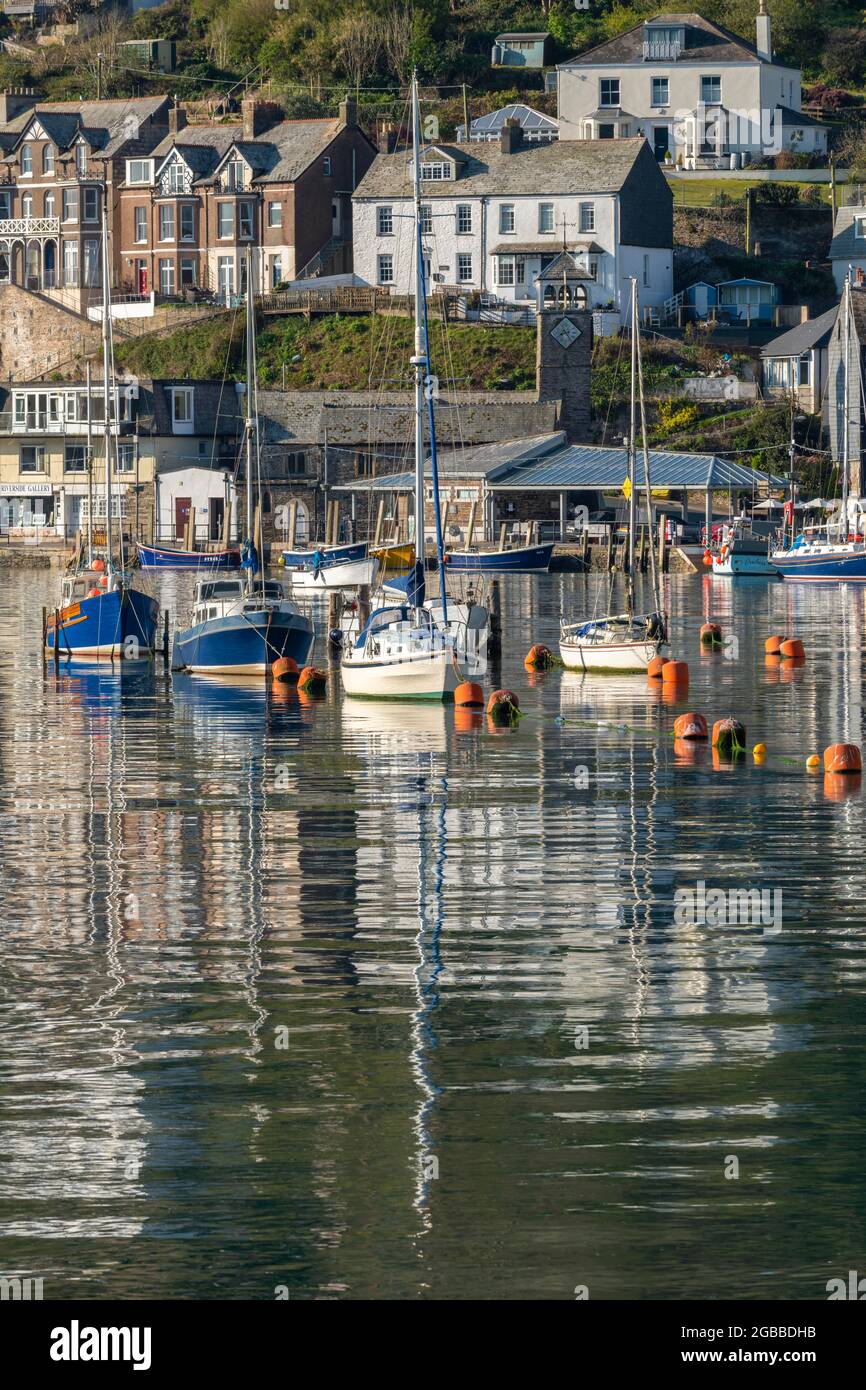 Boats moored in Looe's pretty harbour at dawn in spring, Looe, Cornwall, England, United Kingdom, Europe Stock Photo