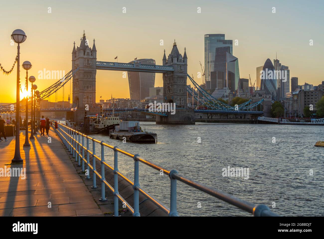 View of Tower Bridge and the City of London in the background at sunset ...