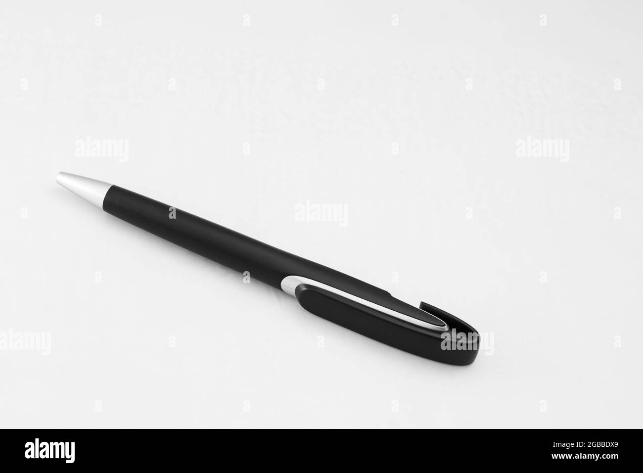 ballpoint pen on an isolated white background Stock Photo - Alamy