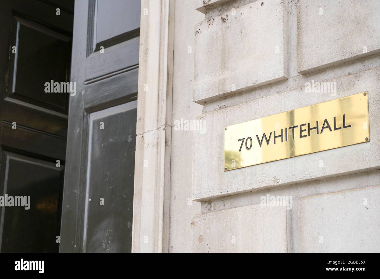 70 WHITEHALL building banner, polished golden plate London England Stock Photo