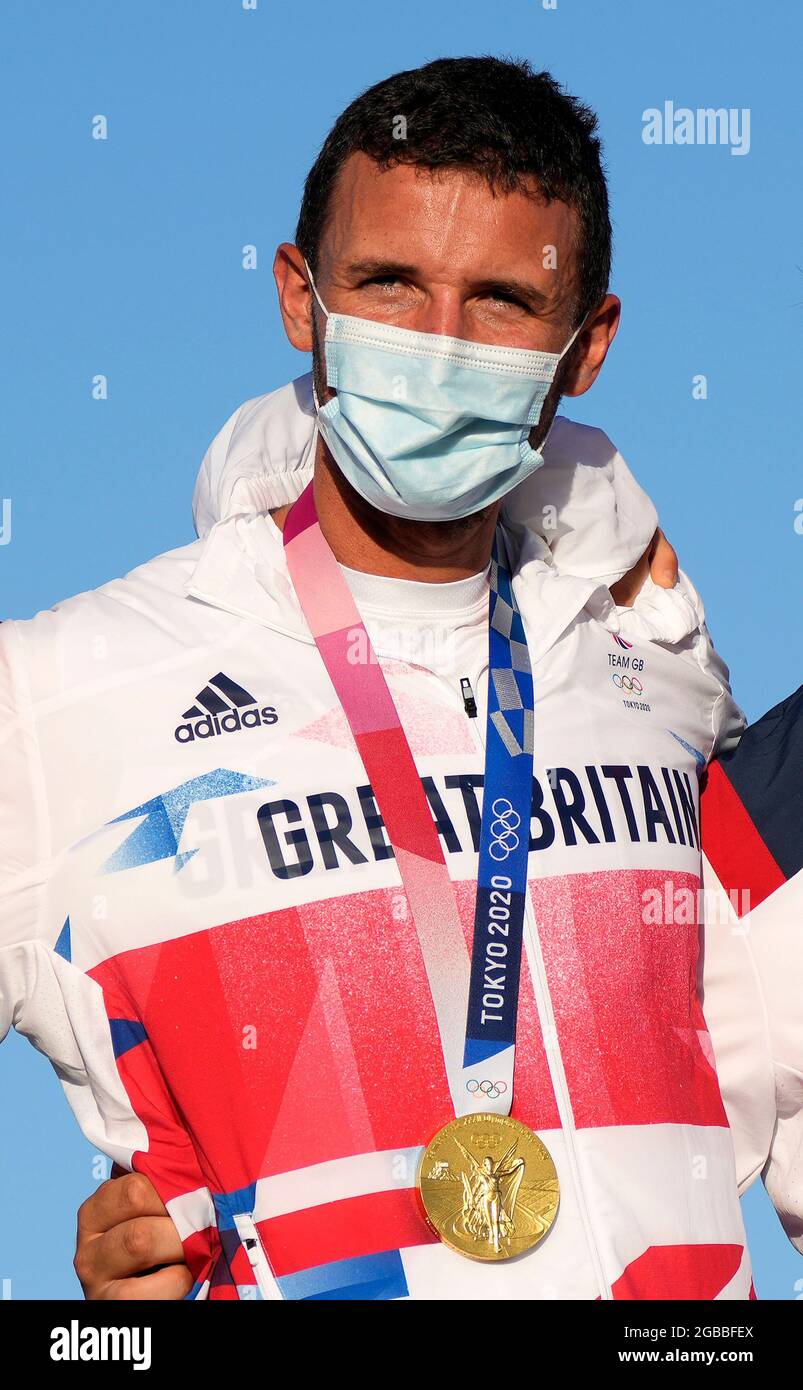 Great Britain's Giles Scott with his Gold after the Men’s Finn medal race during the Sailing at Enoshima on the eleventh day of the Tokyo 2020 Olympic Games in Japan. Picture date: Tuesday August 3, 2021. Stock Photo