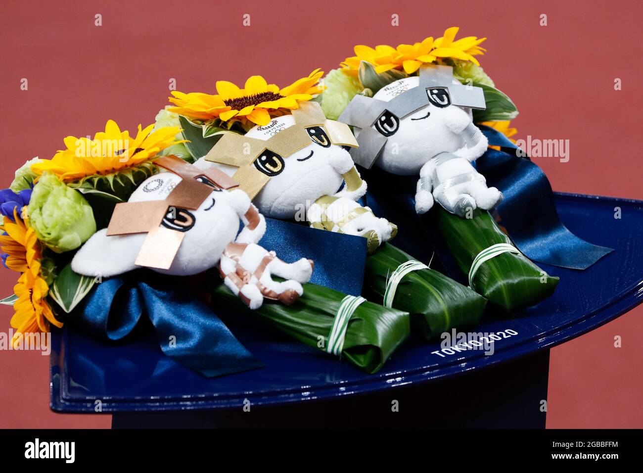 Tokyo, Japan. 03rd Aug, 2021. Olympic mascots and flowers are set out