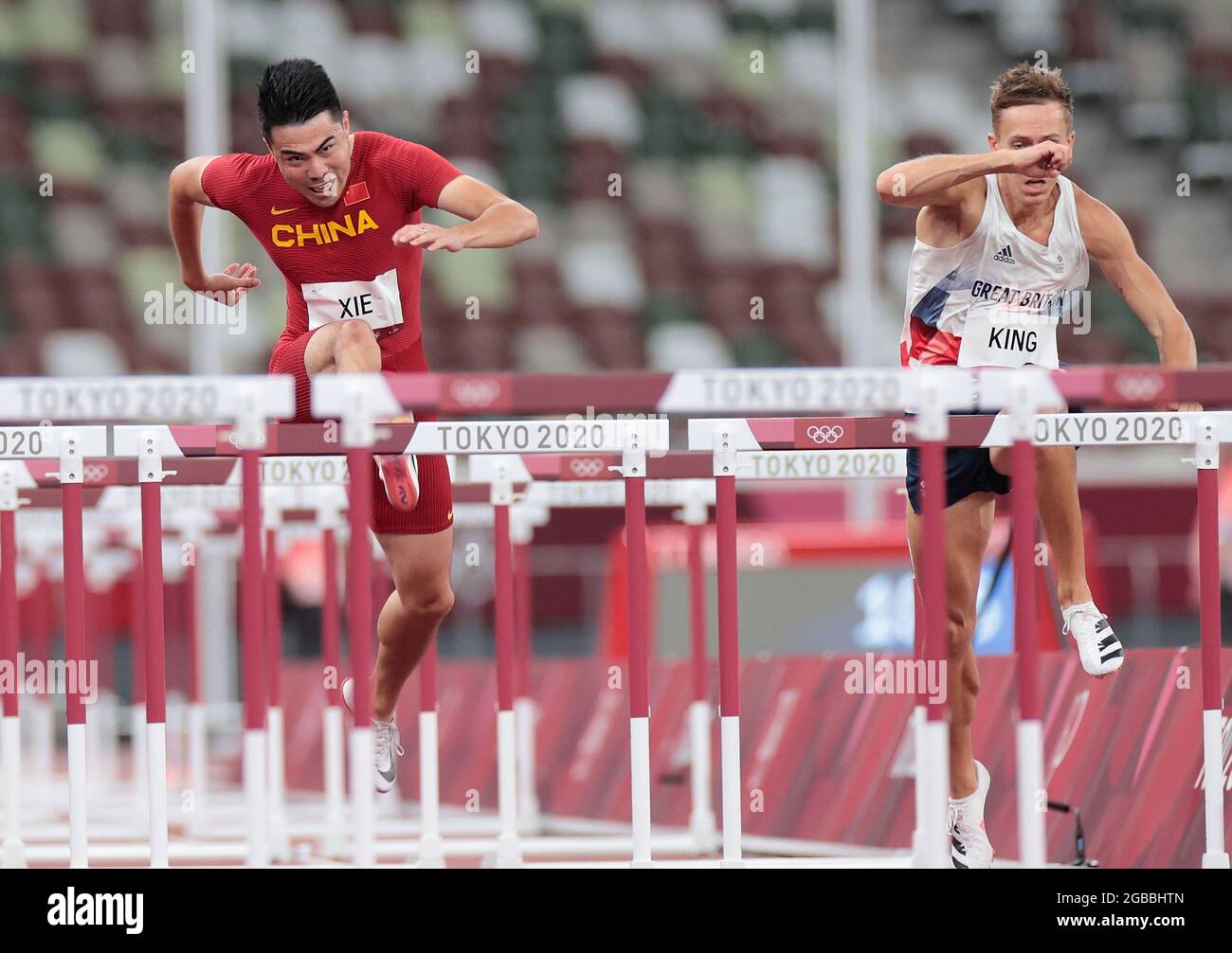 Tokyo, Japan. 3rd Aug, 2021. Xie Wenjun (L) of China competes during ...