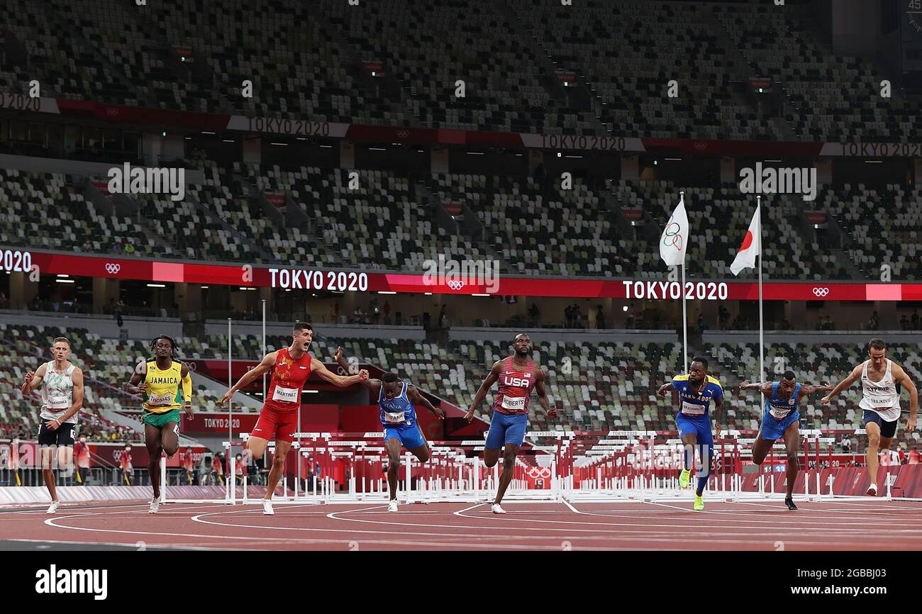 (210803) -- TOKYO, Aug. 3, 2021 (Xinhua) -- Athletes compete during the Men's 110m Hurdles Heat at the Tokyo 2020 Olympic Games in Tokyo, Japan, Aug. 3, 2021. (Xinhua/Li Gang) Stock Photo