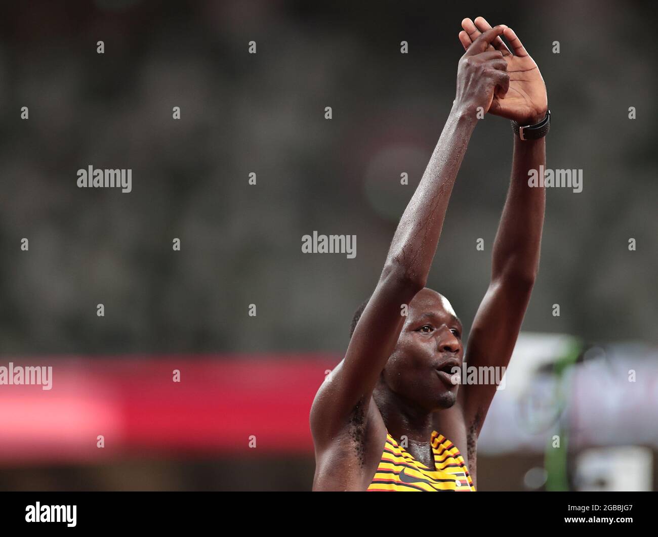 (210803) -- TOKYO, Aug. 3, 2021 (Xinhua) -- Oscar Chelimo of Uganda reacts during the men's 5000m heats at Tokyo 2020 Olympic Games, in Tokyo, Japan, Aug. 3, 2021. (Xinhua/Li Gang) Stock Photo