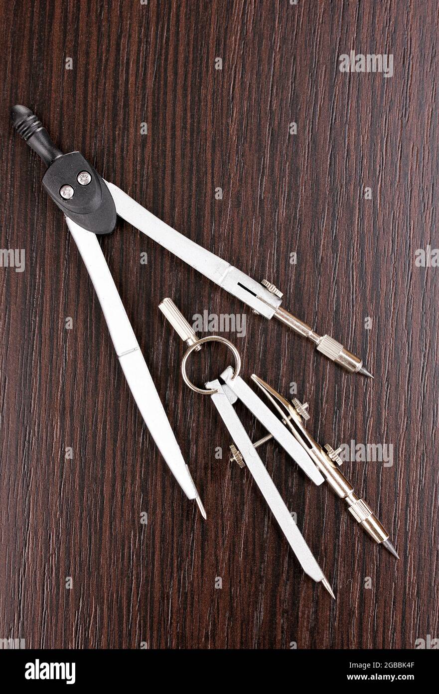 Drafting instruments on wooden background Stock Photo Alamy