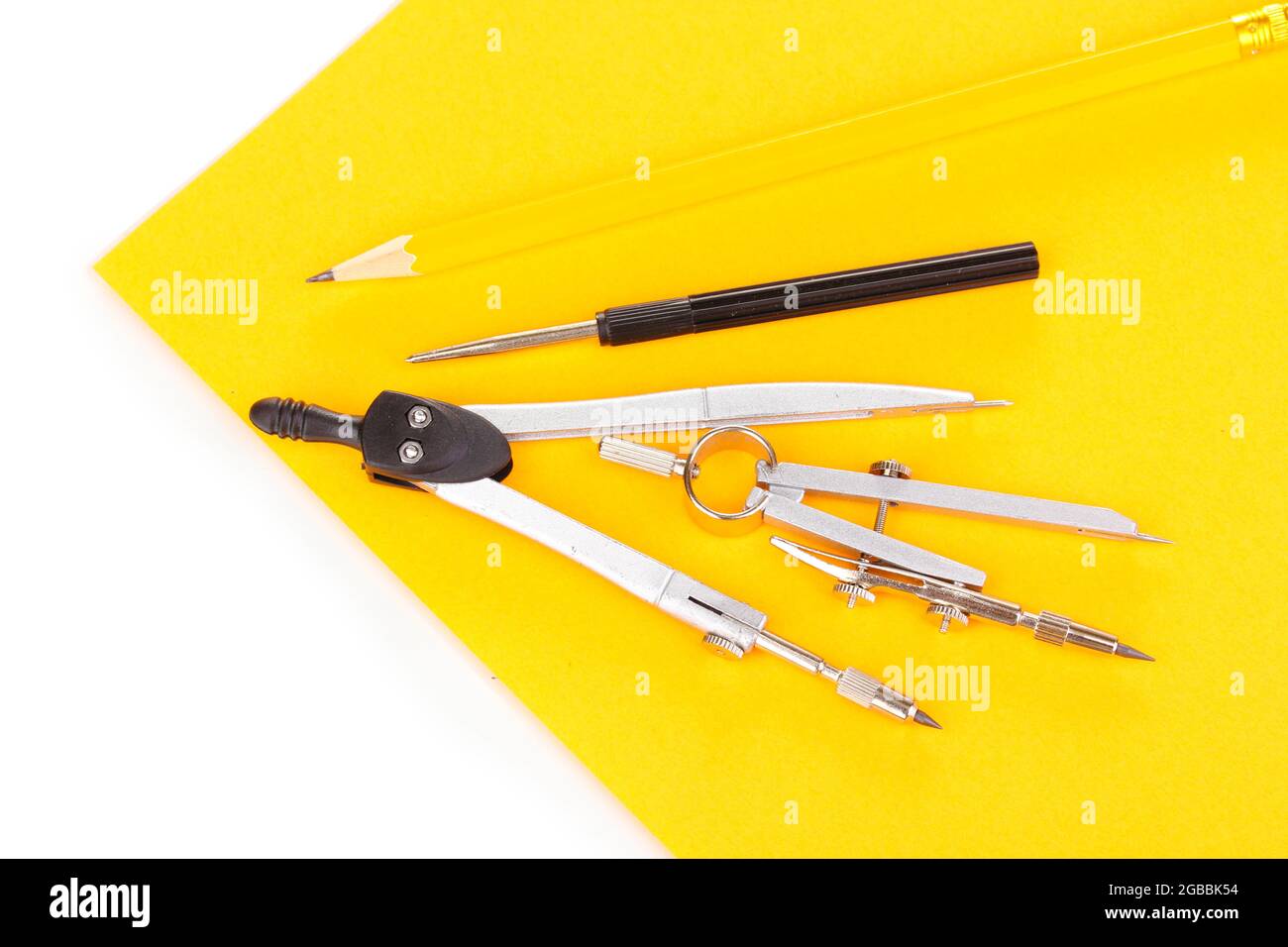 Drafting instruments on color paper isolated on white Stock Photo Alamy
