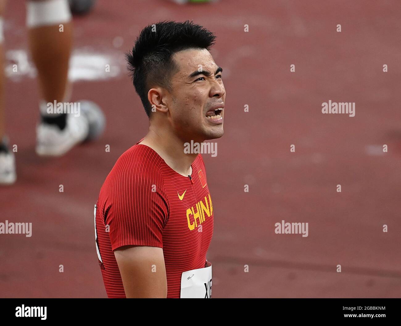 Tokyo, Japan. 3rd Aug, 2021. Xie Wenjun of China reacts after the Men's ...