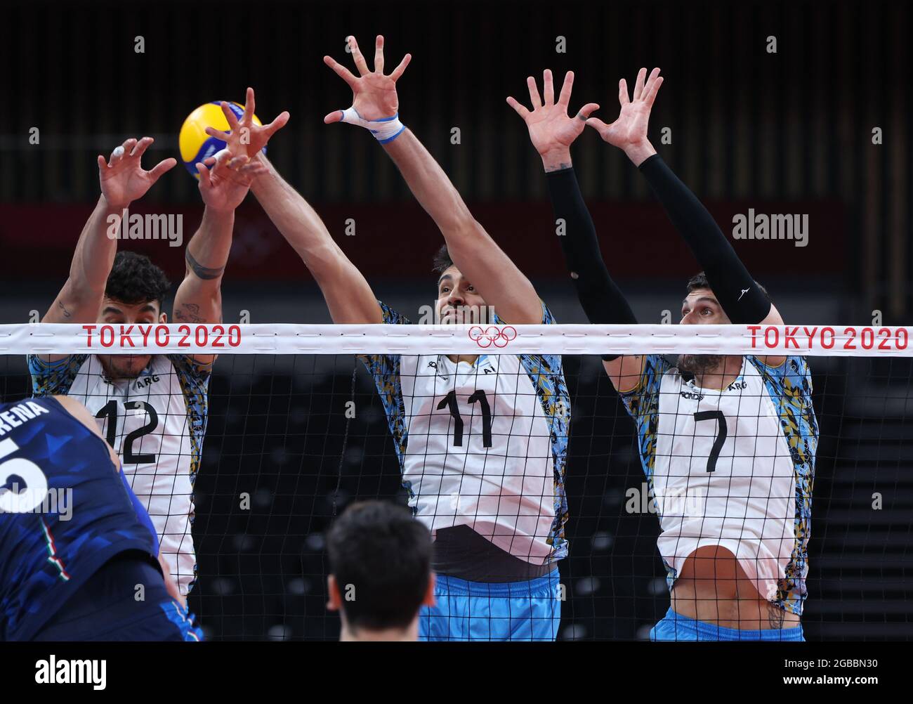 Tokyo, Japan. 3rd Aug, 2021. Bruno Lima (L), Sebastian Sole (C) and Facundo Conte of Argentina block during the men's quarterfinal of volleyball between Argentina and Italy at the Tokyo 2020 Olympic Games in Tokyo, Japan, Aug. 3, 2021. Credit: Ding Ting/Xinhua/Alamy Live News Stock Photo