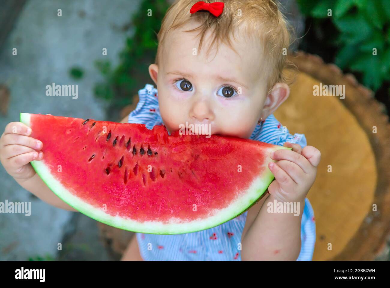 Baby Eats Watermelon In Summer Selective Focus Food Stock Photo Alamy