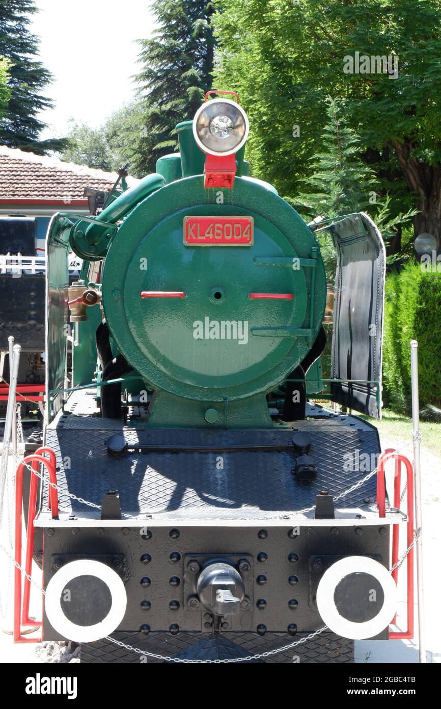 Trains of Turkey, Green Ancient Soldier Train and Black K2201 Train at TURASAS Railway Museum Outdoor Stock Photo