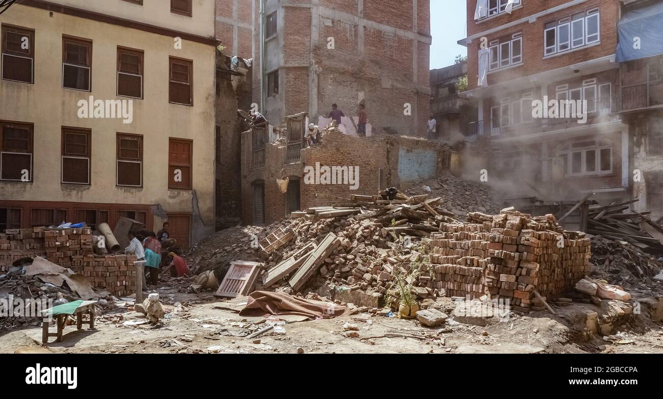 Clearing of debris from brick buildings collapsed after the April 2015