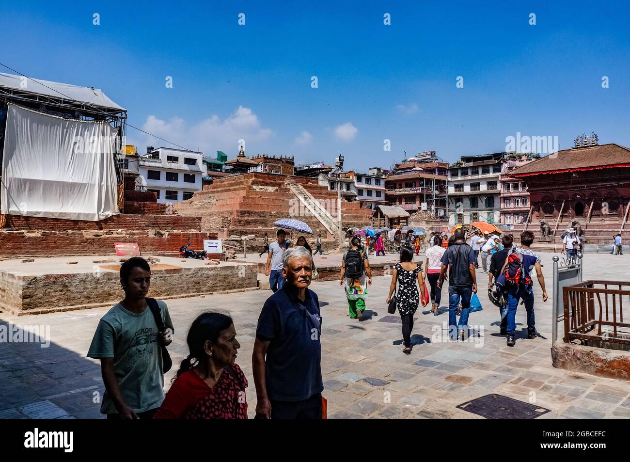 Maru Tol square in Kathmandu, with the stepped podium of the Magu Taleju temple, destroyed in the 2015 Nepal earthquake Stock Photo