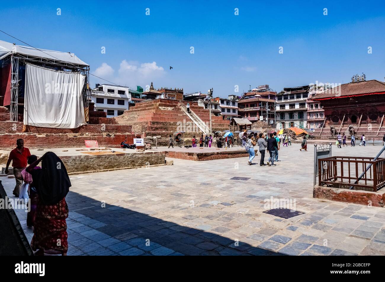 Maru Tol square in Kathmandu, with the stepped podium of the Magu Taleju temple, destroyed in the 2015 Nepal earthquake Stock Photo