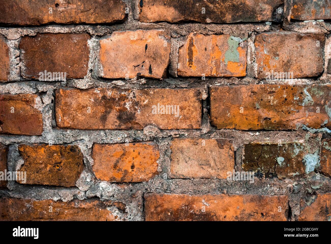 Red brick wall texture grunge background with vignetted corners Stock Photo