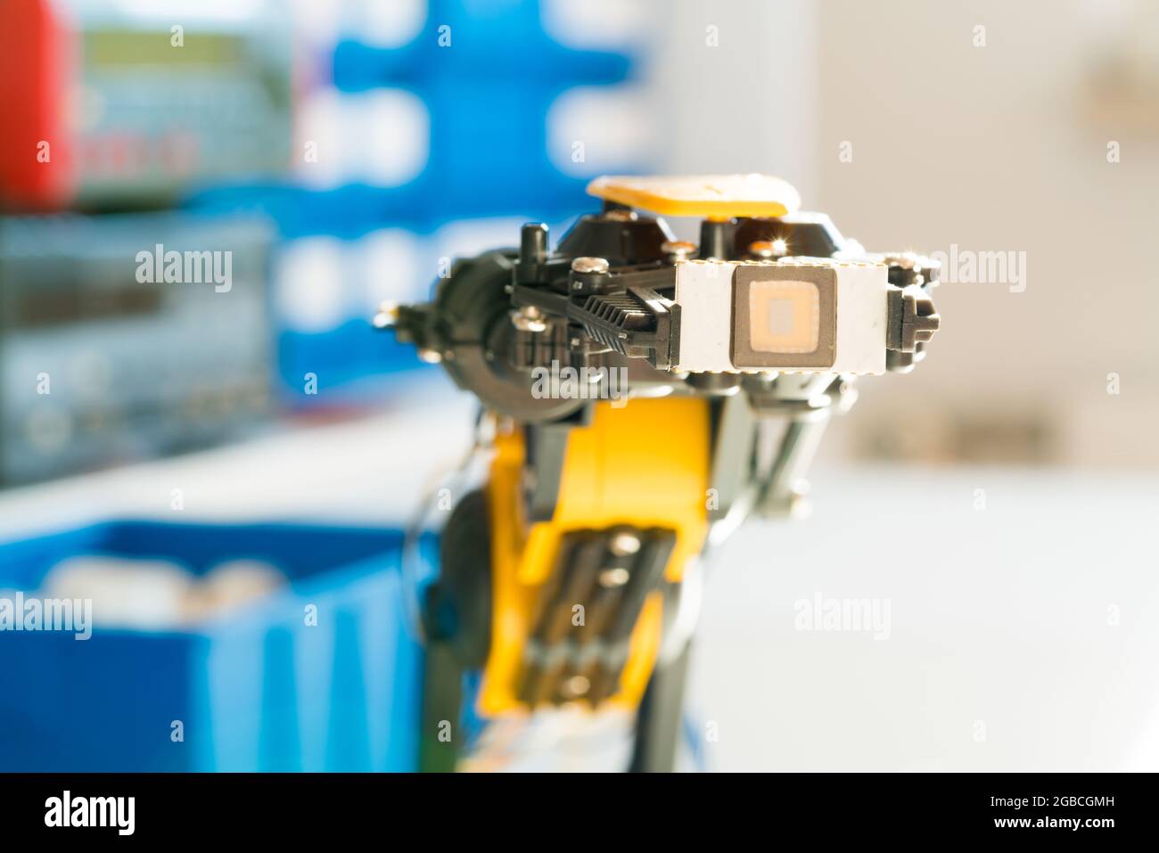 Robot with a processor chip in hand Stock Photo - Alamy