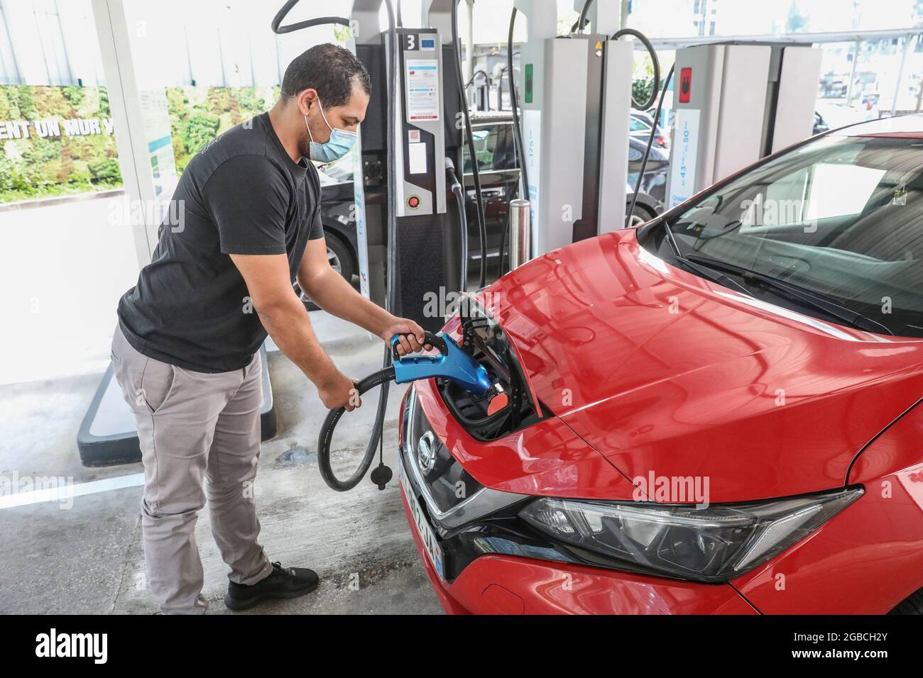 ELECTRIC CHARGING STATION TOTAL ENERGIES, LA DEFENSE, FRANCE Stock