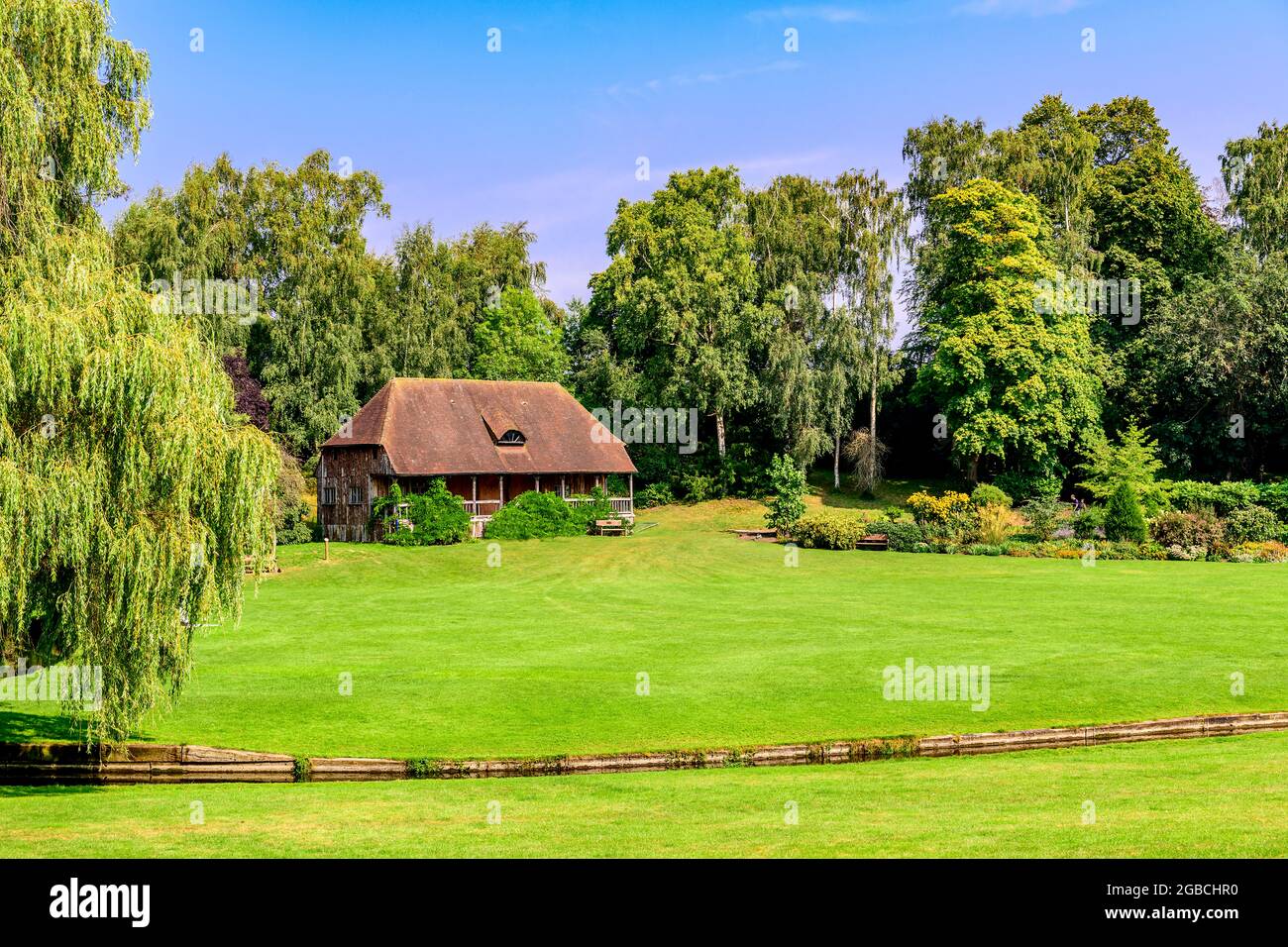 Dilapidated cottage and field in the grounds of Leeds castle kent UK Stock Photo