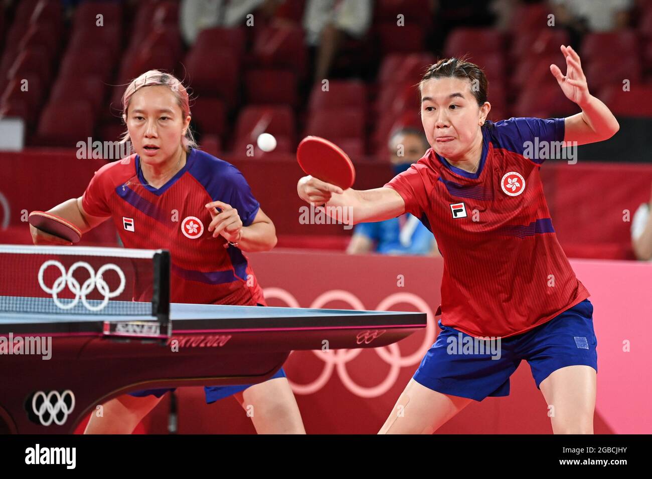 210803) -- TOKYO, Aug. 3, 2021 (Xinhua) -- Li Ho Ching (R) and Soo Wai Yam  Minnie of China's Hong Kong compete against Ishikawa Kasumi and Hirano Miu  of Japan during the