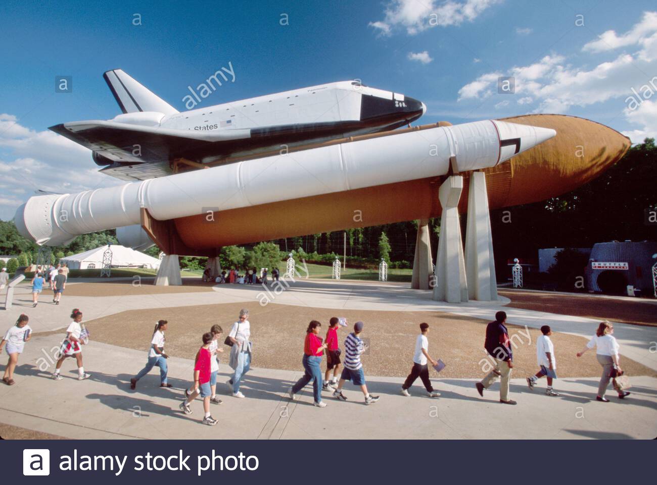 Huntsville Alabama,US Space & Rocket Center,shuttle solid rocket booster exhibit Space Camp,students visiting group class field trip boys girls kids Stock Photo