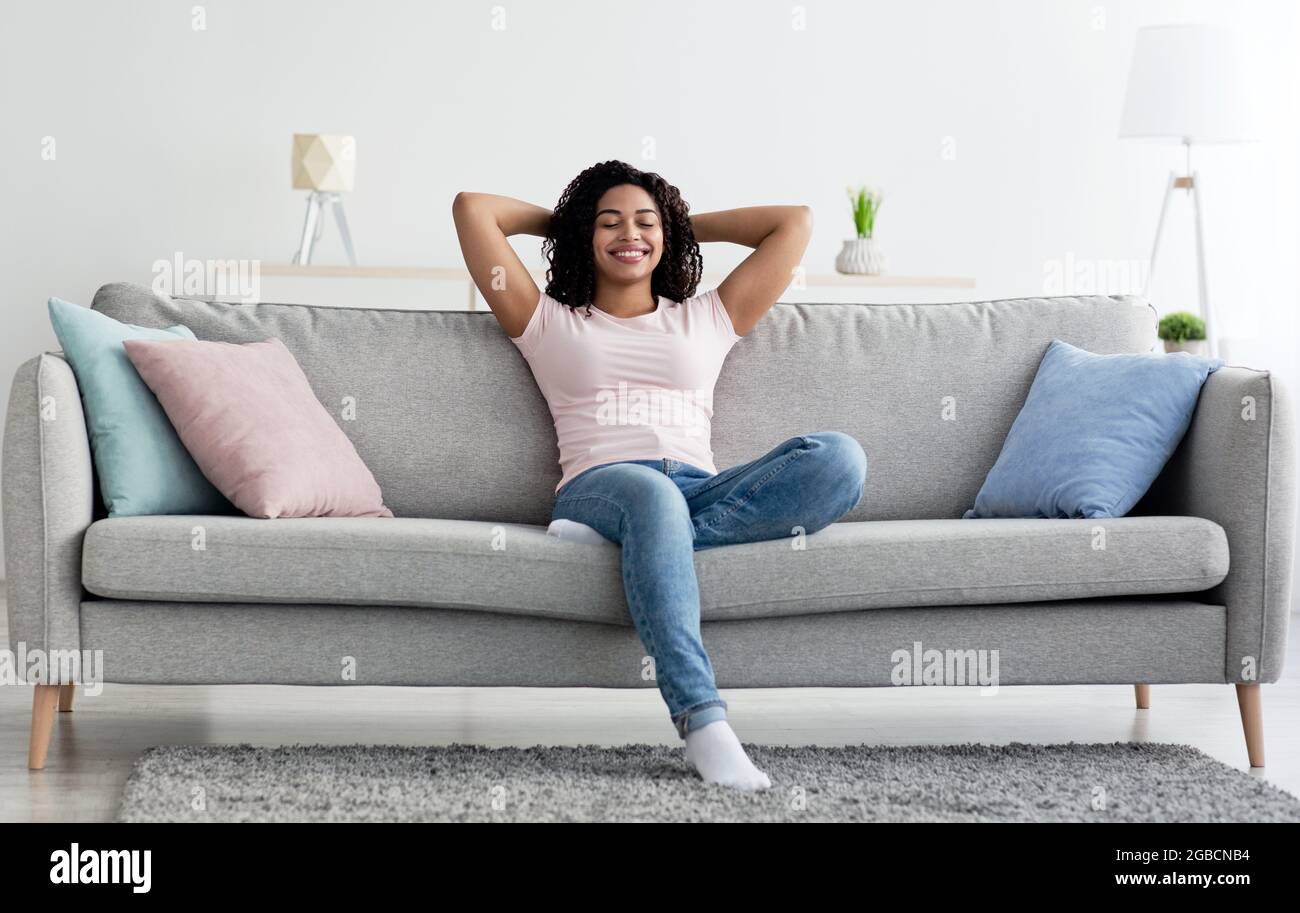 Rest after cleaning house or work, happy facial expression and relax, covid-19 quarantine Stock Photo