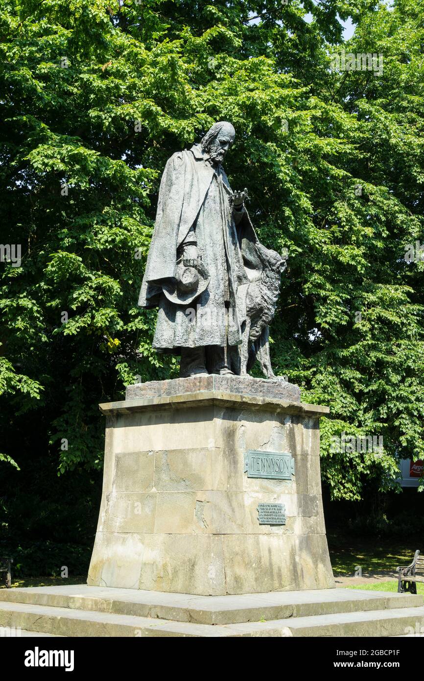 Statue of Alfred Lord Tennyson standing in Lincoln Cathedral grounds, Lincoln Ciy, Lincolnshire 2021 Stock Photo