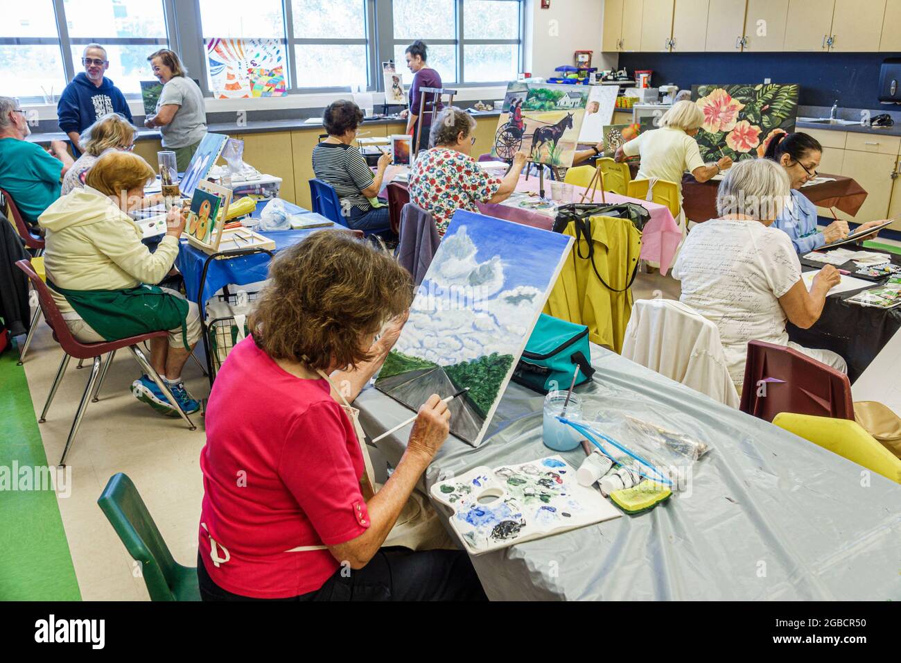 Miami Beach Florida,North Shore Community Center centre,adult education older adults seniors,art class canvas painting adults women hobby active, Stock Photo