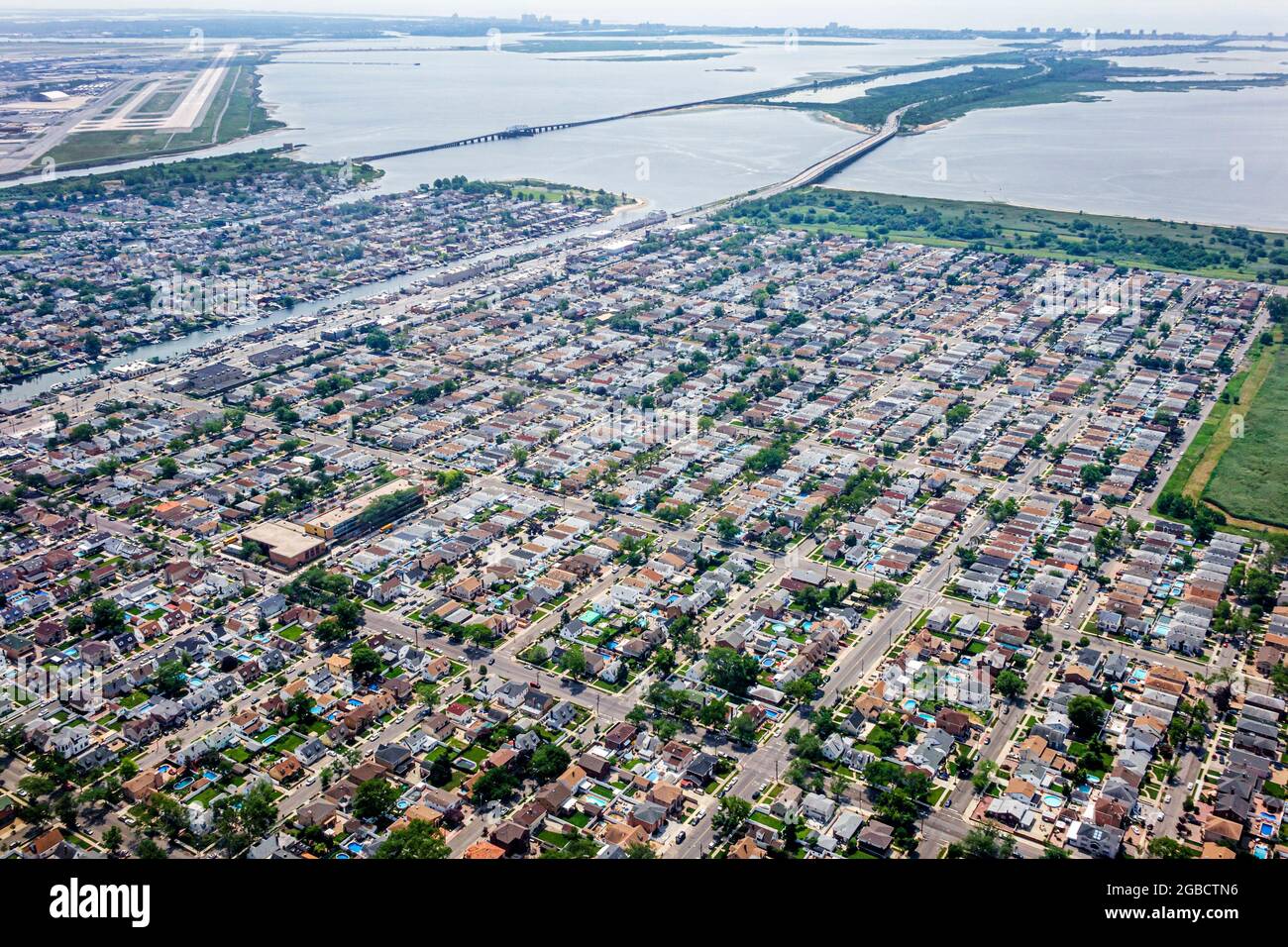 New York City,NY NYC Queens,John F. Kennedy International Airport JFK,aerial overhead above view approach approaching Jamaica Bay Howard Beach, Stock Photo