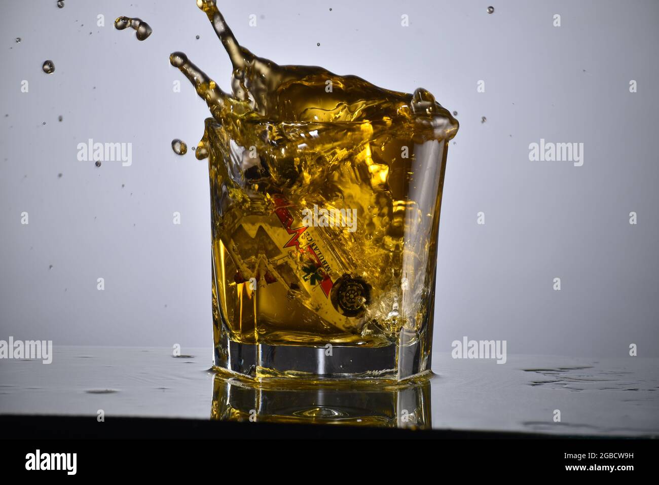 Car Drown in Alcohol Glass, Drink and Drive Concept Stock Photo