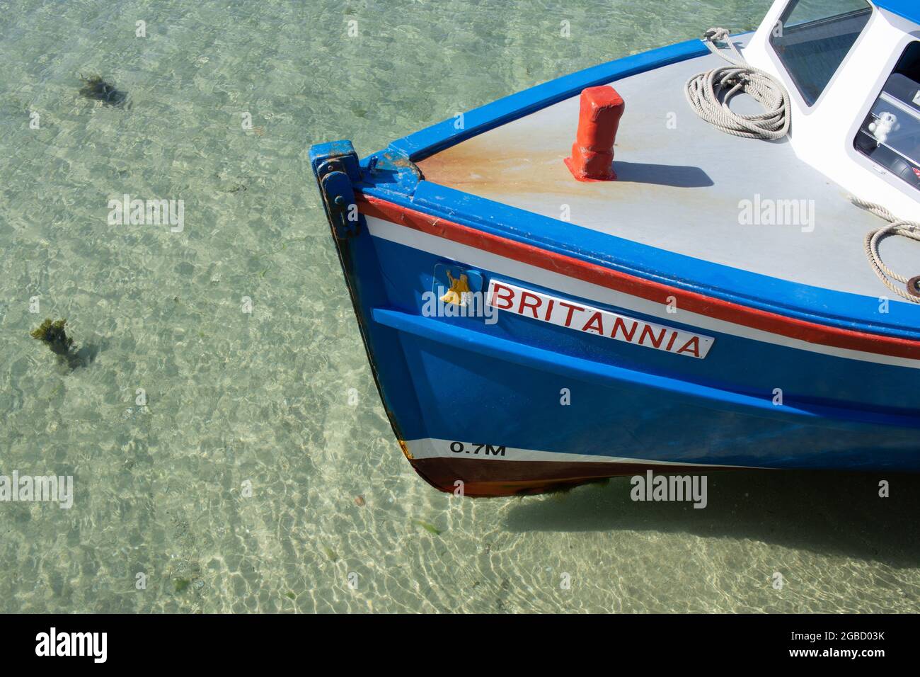 Britannia boat bow in clear water, Isles of Scilly, Cornwall, England UK. Stock Photo