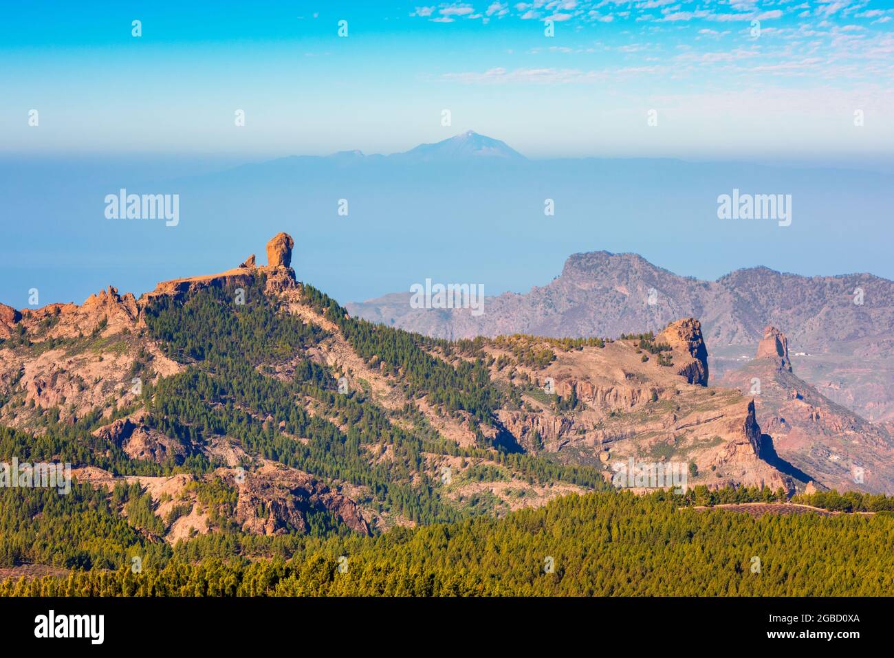 View on the Roque Nublo And El Teide on Tenerife as seen from one of the high points on Gran Canaria Spain Stock Photo