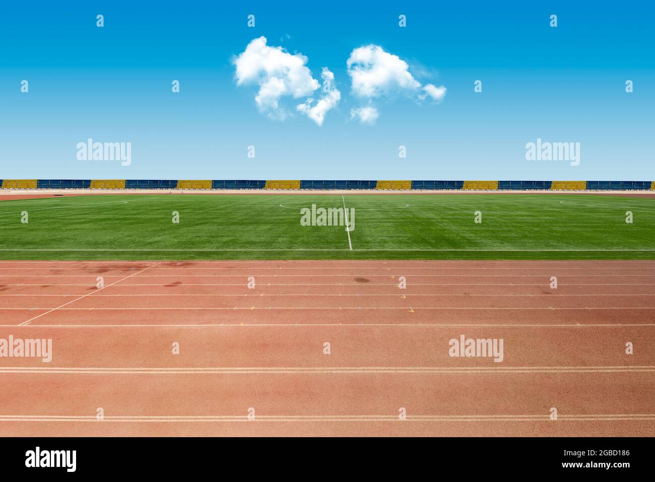 Soccer game field and athletics track Stock Photo Alamy