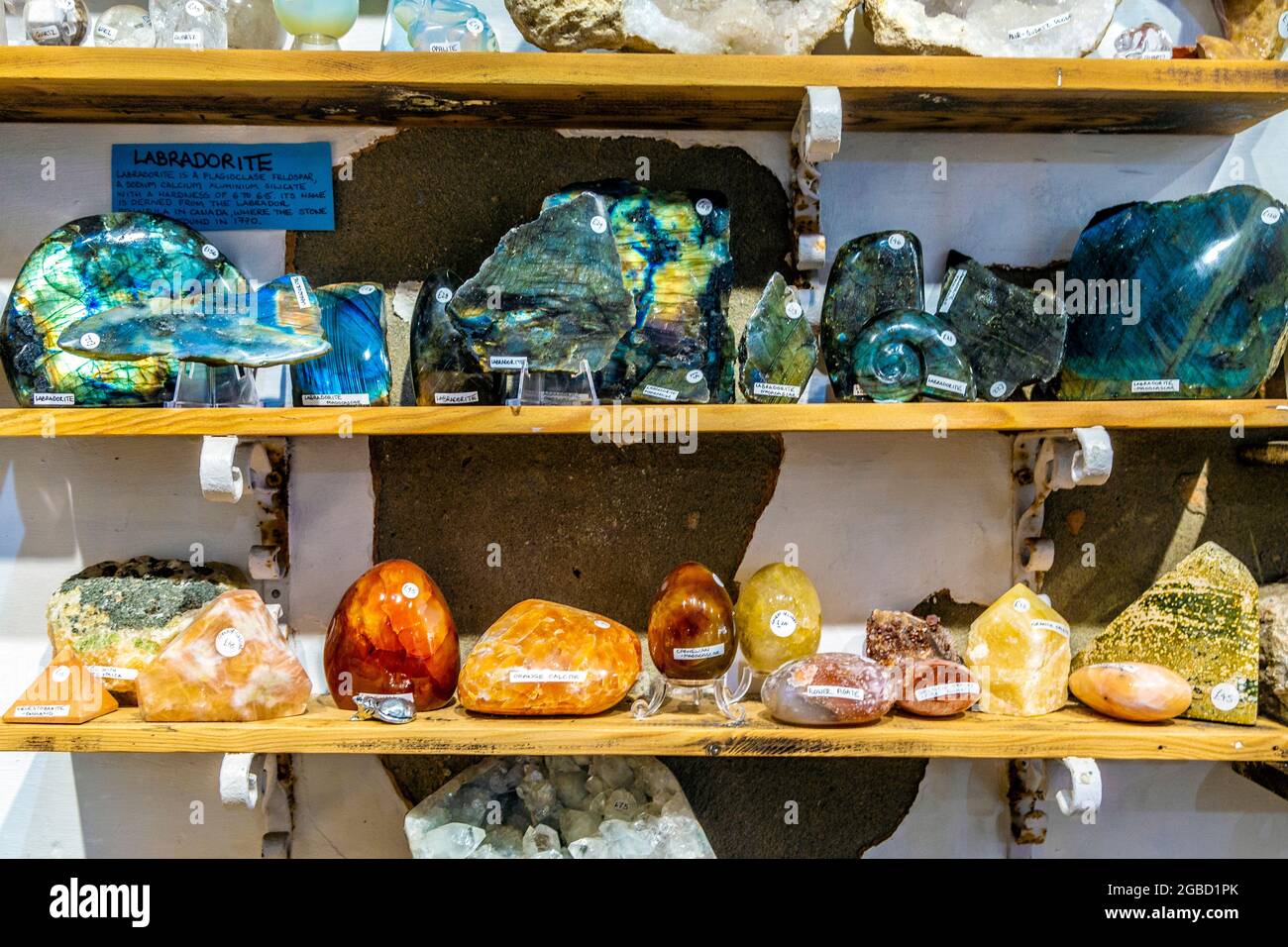 Selection of precious minerals and crystals at Emjems crystal and gem shop, St Ives, Cornwall, UK Stock Photo