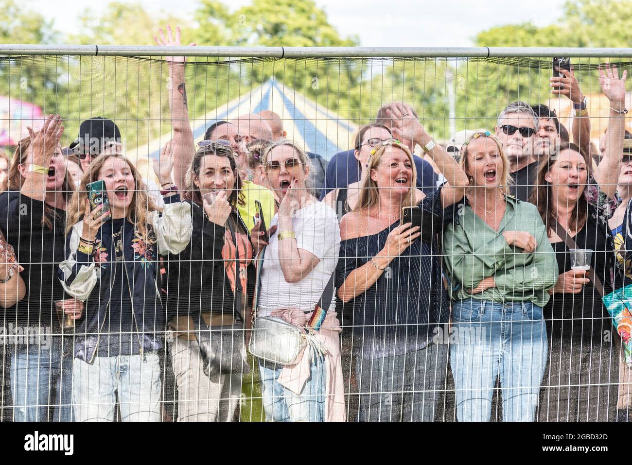 Peter Andre fans at Fantasia music concert in Maldon, Essex, UK soon after lifting of COVID restrictions. Adoring females shouting for his attention Stock Photo