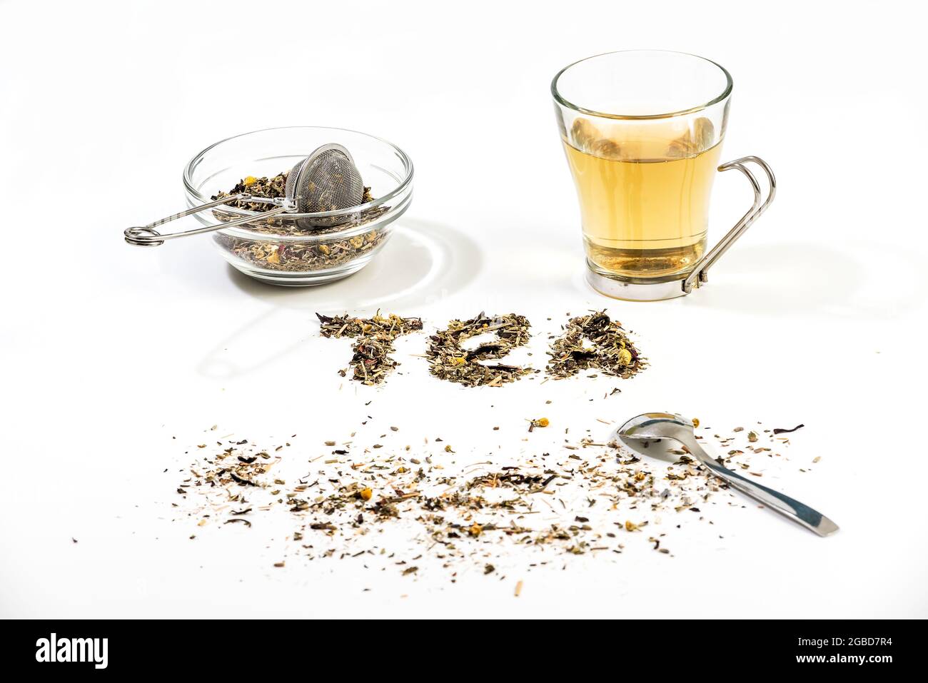 Tea text made by tea leaf on wwhite background surface with a bowl of ...