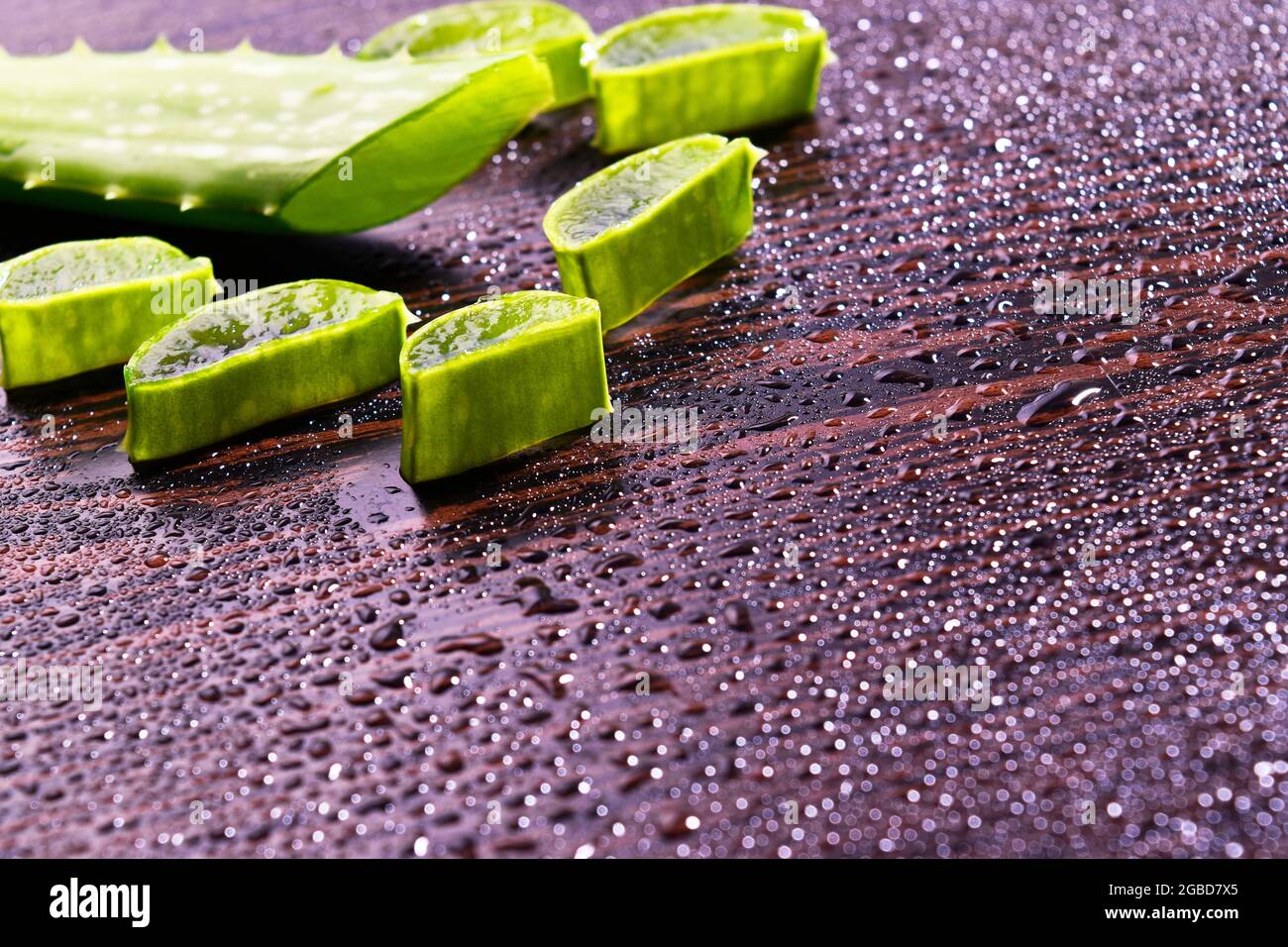Aloe Vera slice on table with Water Drops Stock Photo
