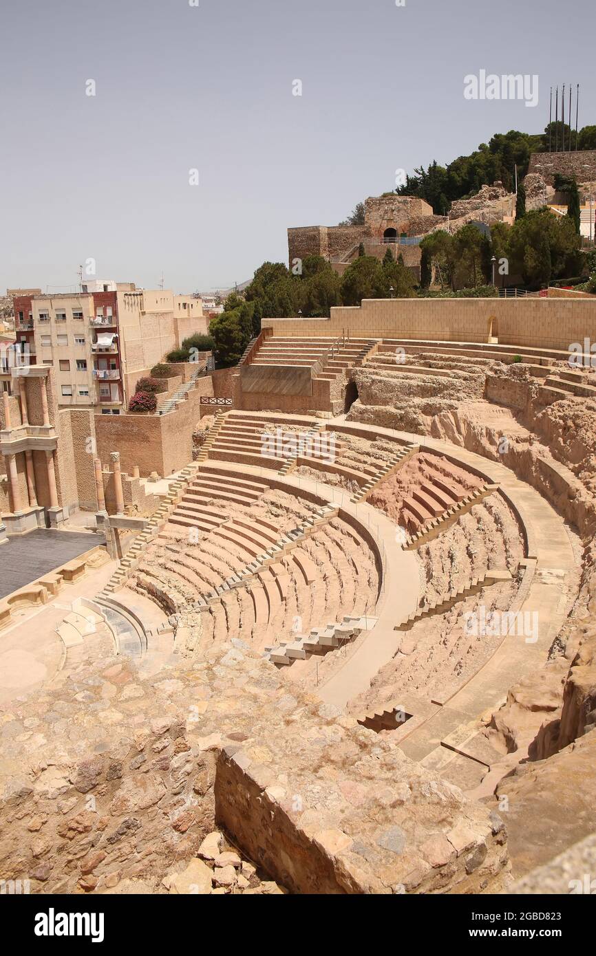 Roman theatre, Cartagena, Spain. Stage, columns and seats carved out of stone in the centre of the city.  Build built in the 1st century B.C. Stock Photo