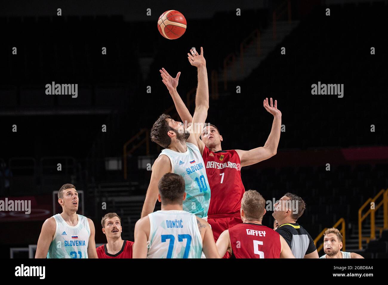 Johannes VOIGTMANN (GER, Mi., r.) Versus Mike TOBEY (SLO), action, game scene; Basketball/Solwenien (SLO) - Germany (GER) 94:70, on August 3rd, 2021; Olympic Summer Games 2020, from 23.07. - 08.08.2021 in Tokyo/Japan. Stock Photo