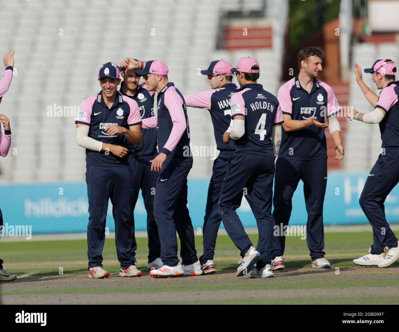 3rd August 2021; Emirates Old Trafford, Manchester, Lancashire, England; Royal London Cup Cricket, Lancashire versus Middlesex; Josh De Caires of Middlesex celebrates with his team mates after he catches Steven Croft of Lancashire off the bowling of Luke Hollman and the advantage is with the visitors Stock Photo