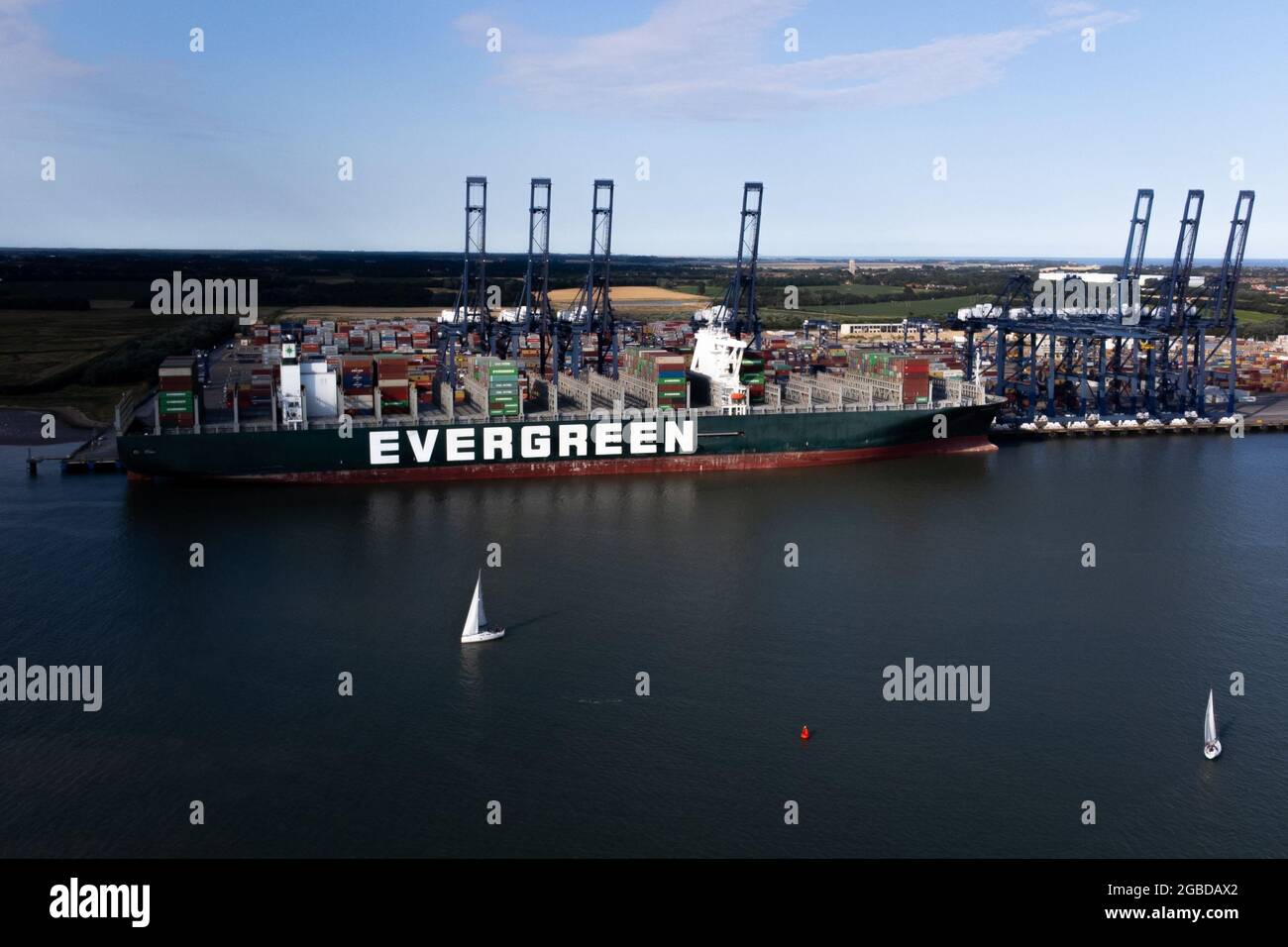 An aerial view of the ship Ever Given at the Port of Felixstowe in Suffolk.  The huge container ship that blocked the Suez Canal is preparing to dock in  the UK for