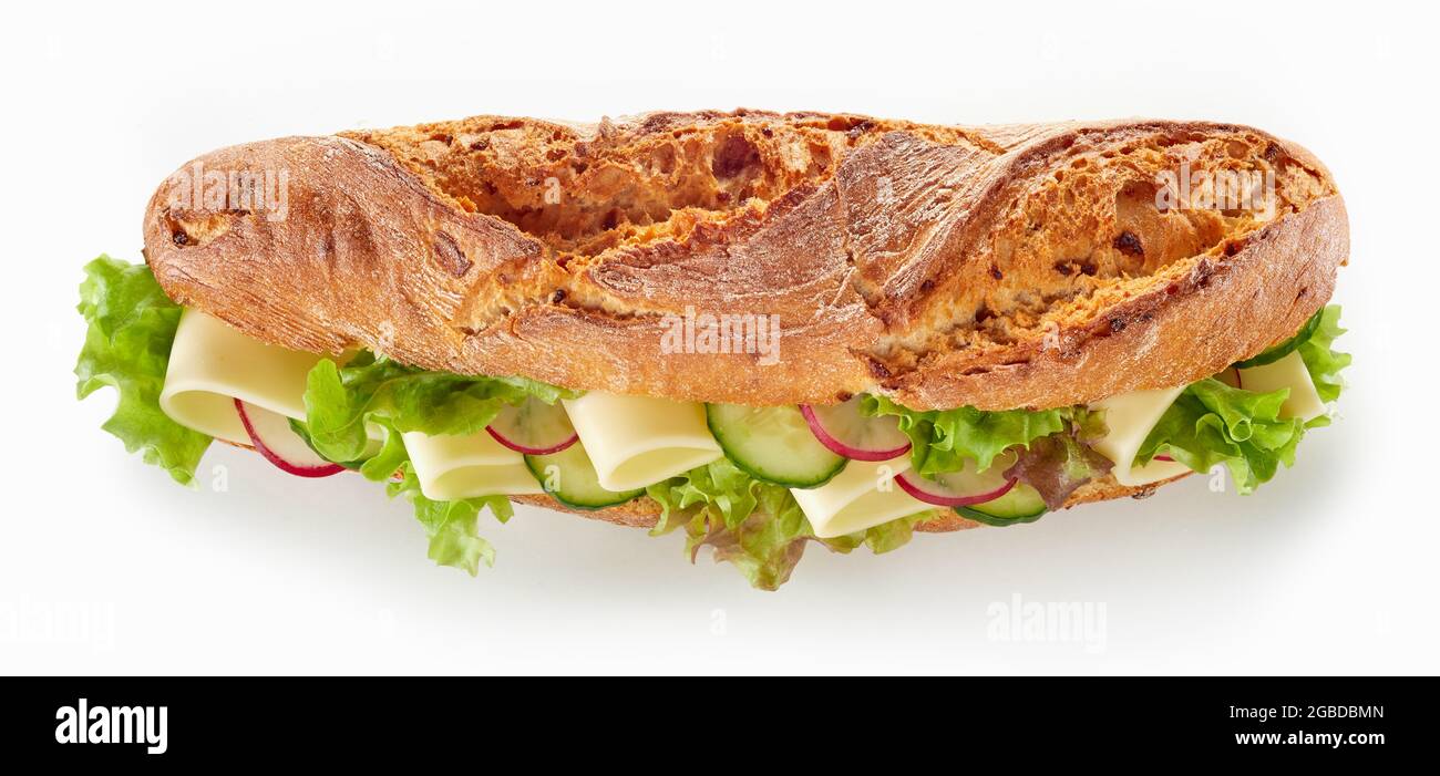 From above of nutritious baguette sandwich with cheese and vegetables served on white table for lunch Stock Photo