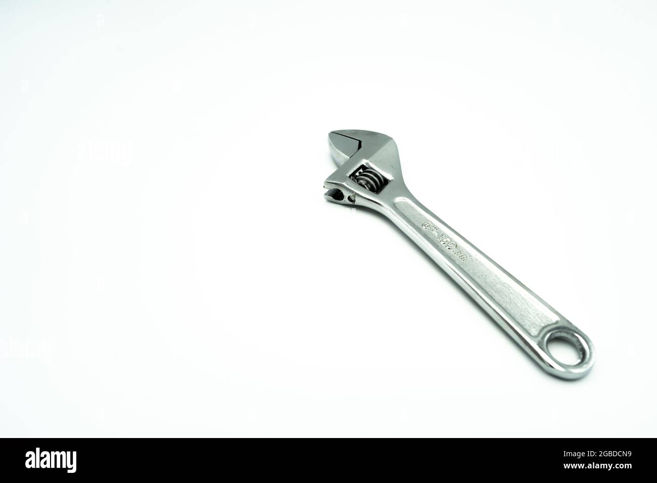 Adjustable wrench isolated on white background Stock Photo - Alamy