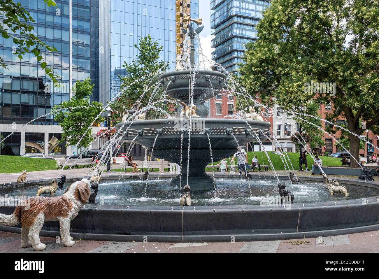 Dog Fountain in Berczy Park in Toronto, Canada. The famous place is a tourist attraction in the Old Town Stock Photo